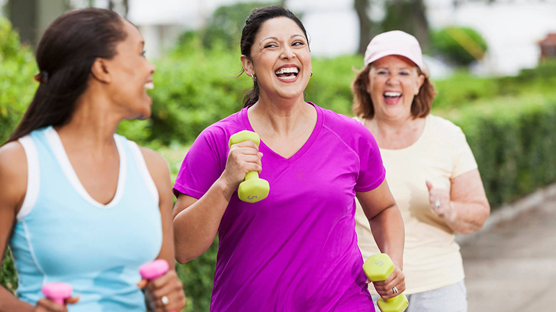 adult women exercising outdoors