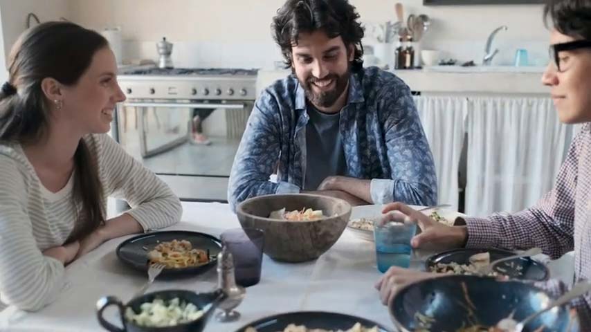 family eating dinner together at home