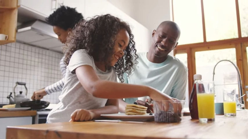 Family enjoying breakfast