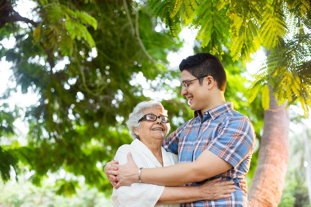 Grandmother and grandson hugging