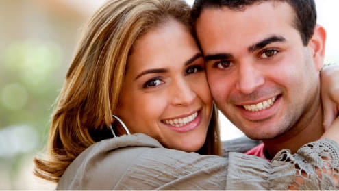 Man and woman smiling