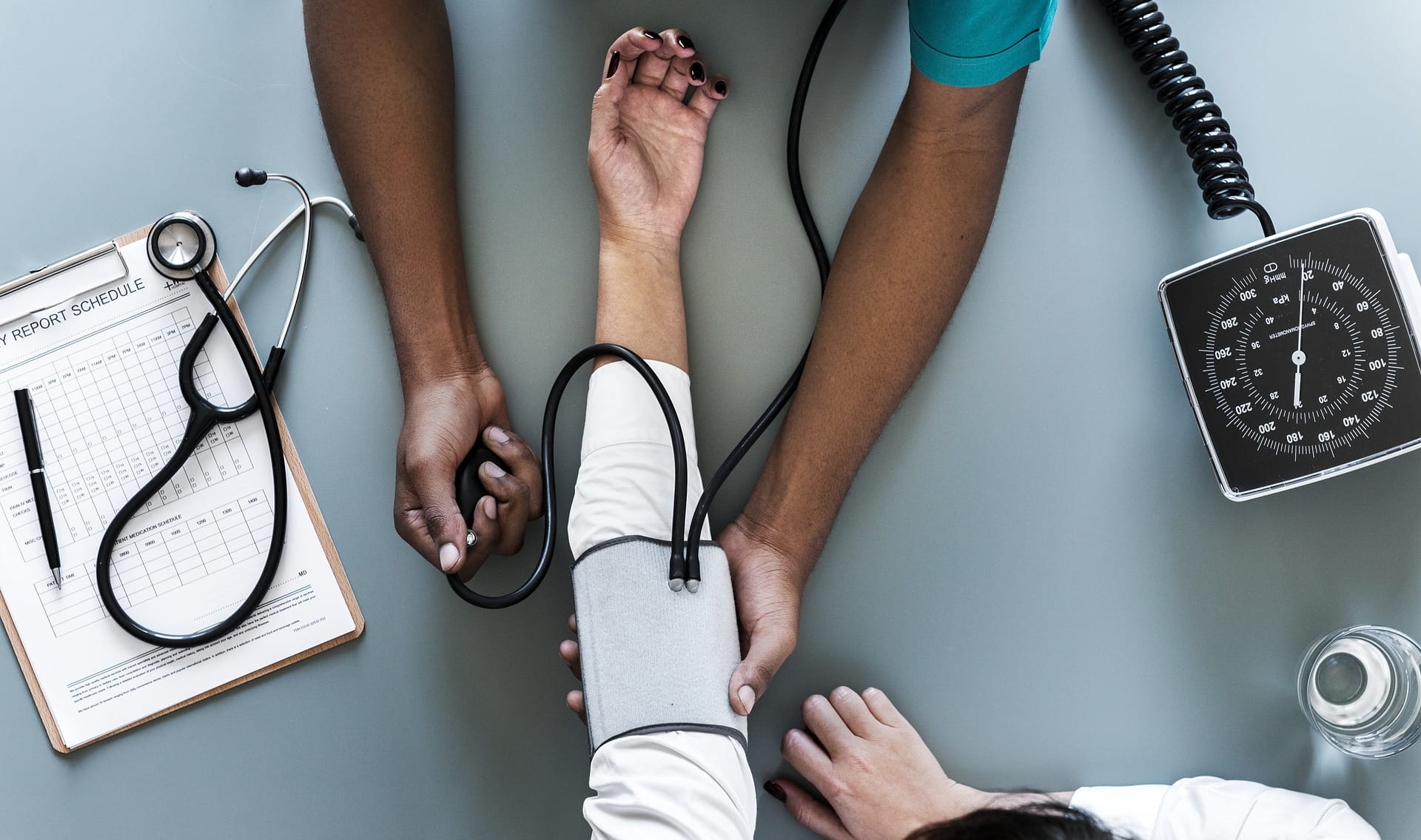 Woman gets blood pressure checked 